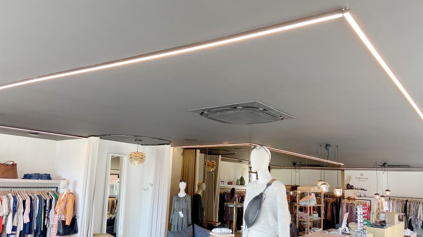 Derved Holde rod LED strips as main lighting in clothing store
